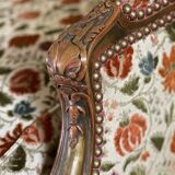 Regency style armchair in gilded wood