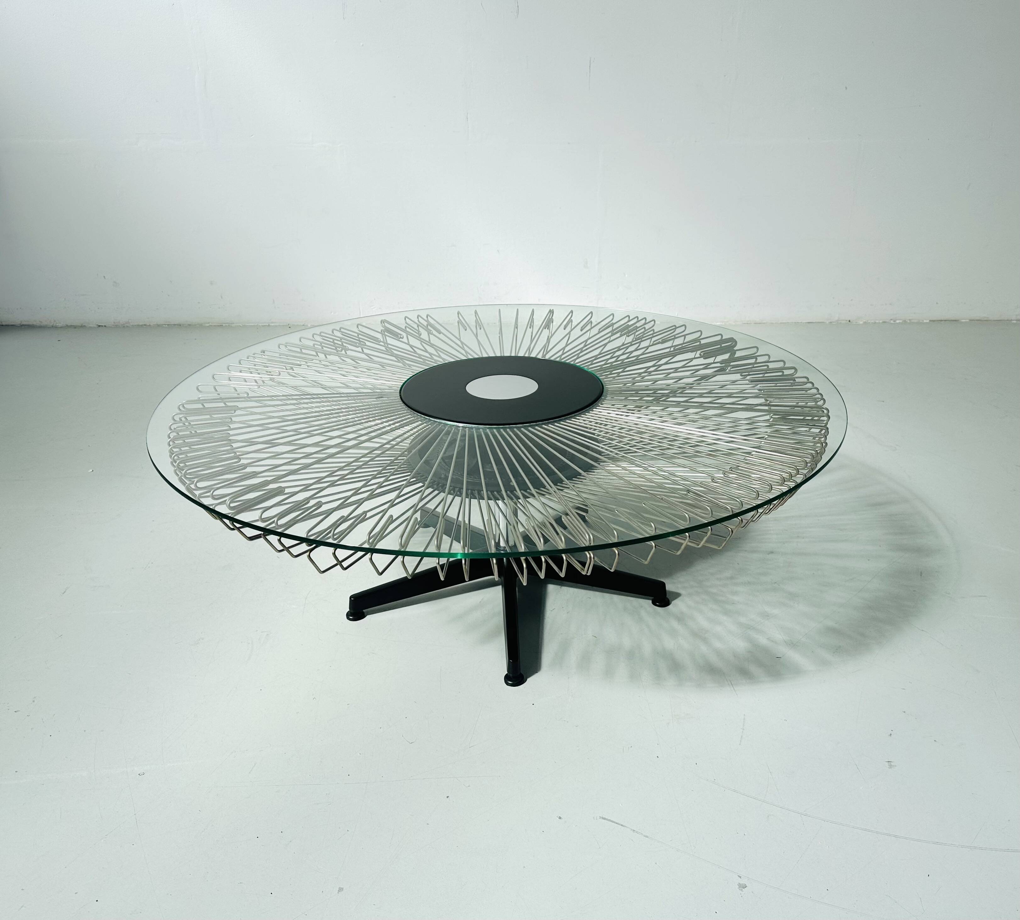Italian rotating glass and metal coffee table designed for Prada, 1990s.