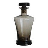 Carafe, bouteille ancienne en verre fumé avec bouchon sculpté.