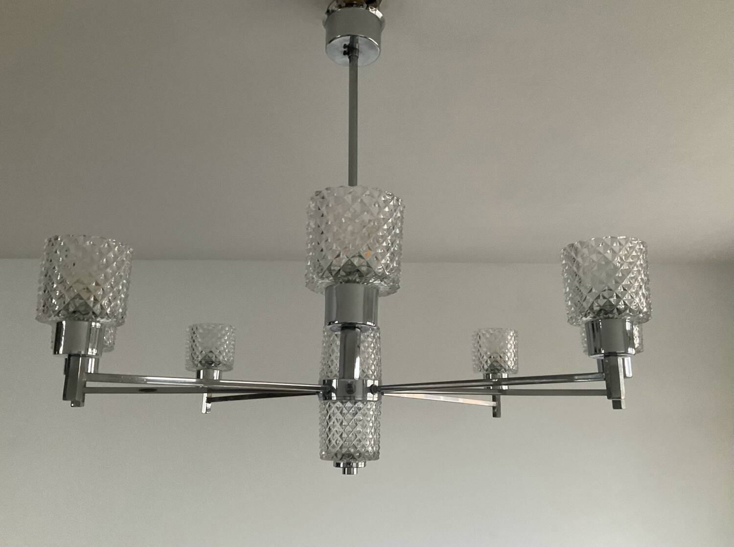 Vintage Italian chandelier from the 60s in chromed metal and glass
