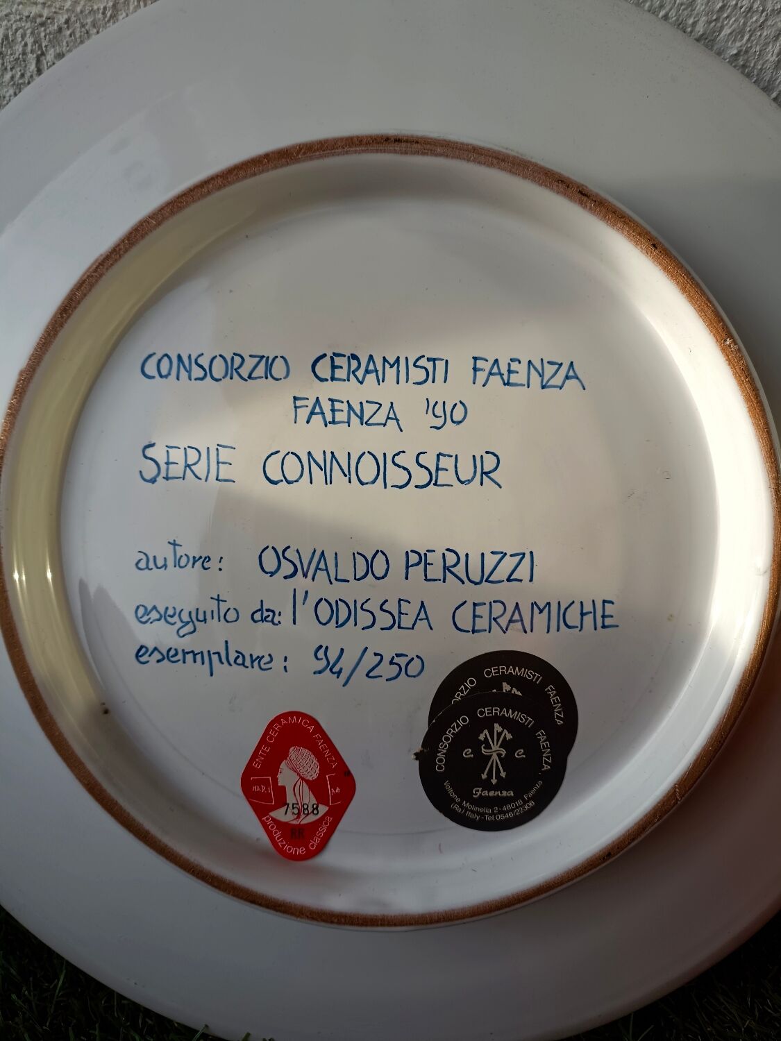 Osvaldo Perruzzi designer of polychrome faience plates.