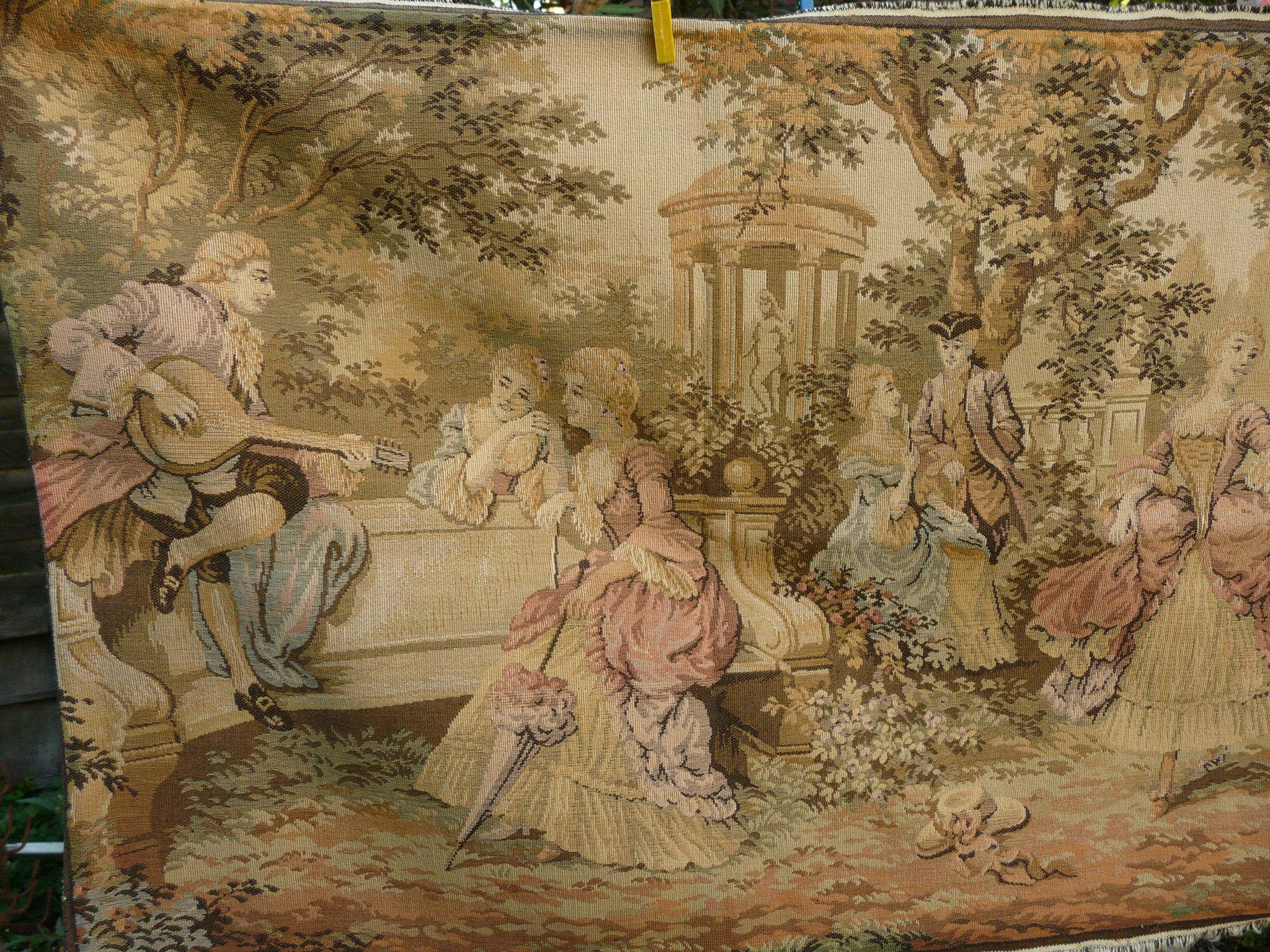 Tapestry wall hanging depicting a gallant scene from the mid-century.