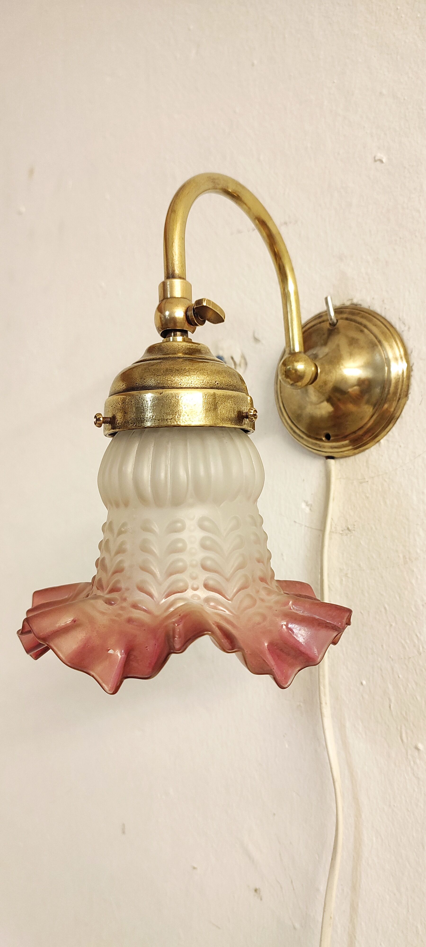 Bronze and glass wall lamp. Spain, 1940s.