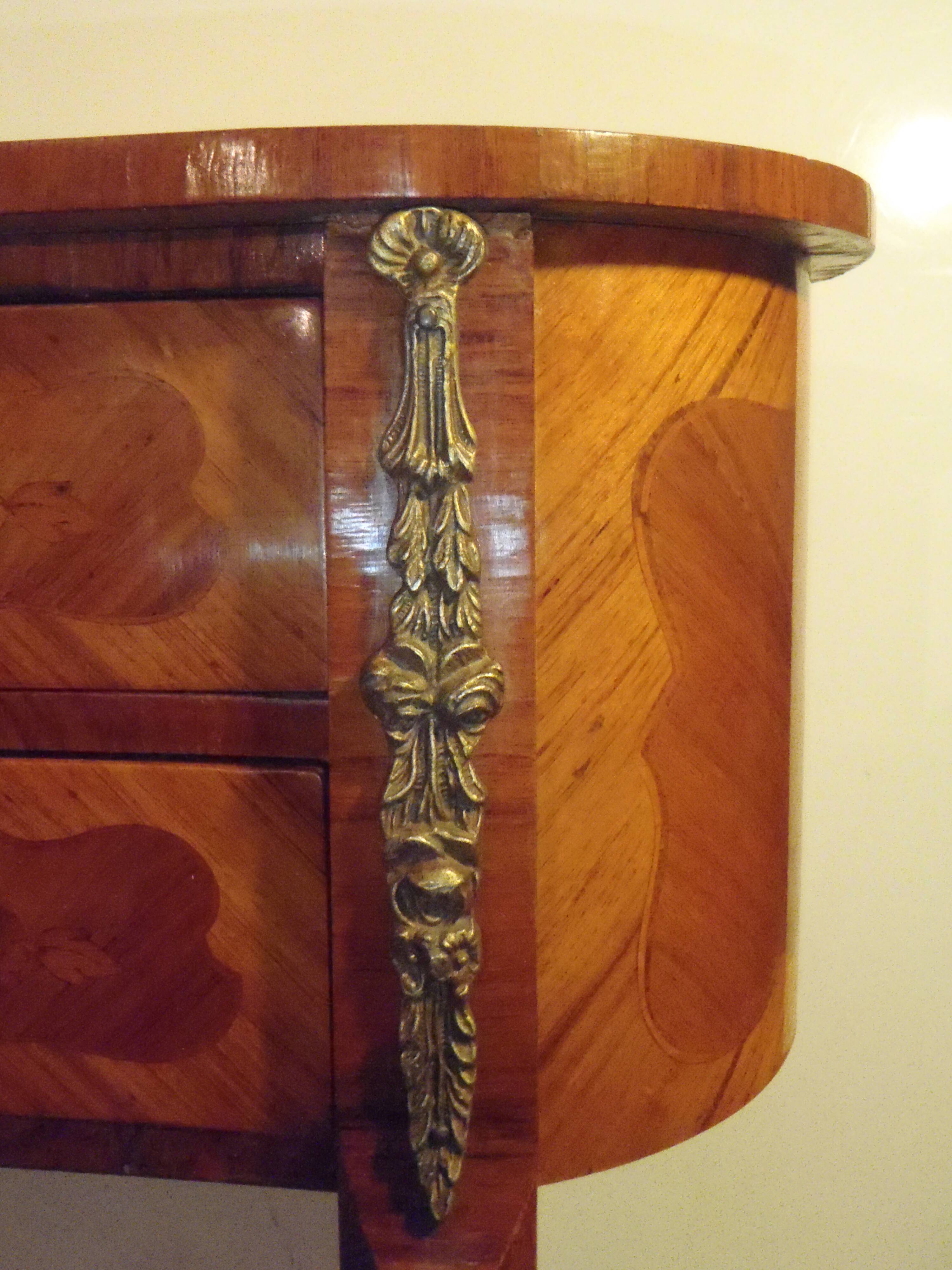 Louis XV style bedside table with varnished marquetry.