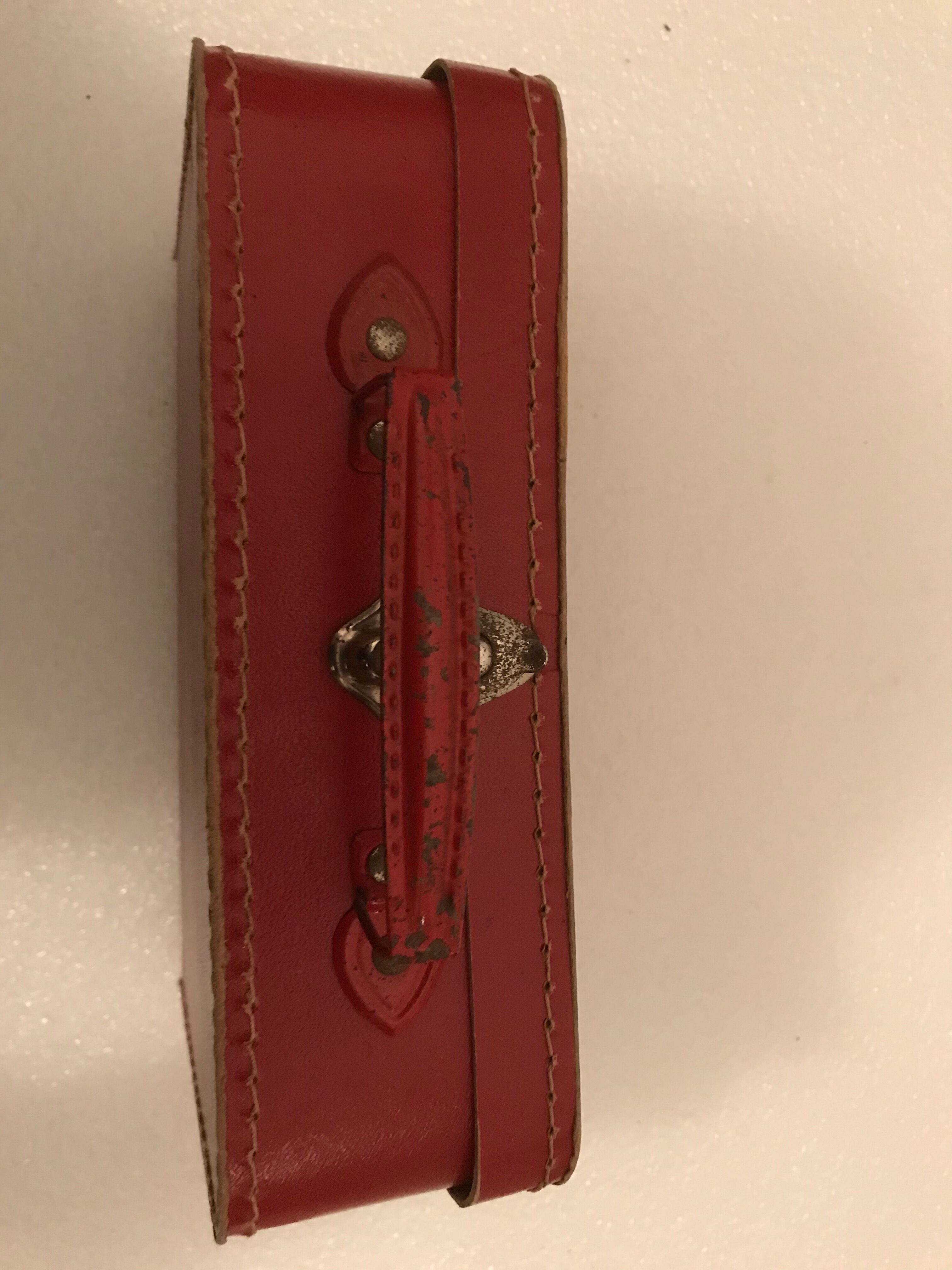 Vintage red card suitcase