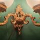 Pair of large double-light wall sconces in vintage brass and glass