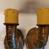 A set of wall lamps in solid brass