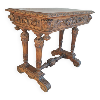 Renaissance console center table in 19th century walnut