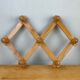 Wooden accordion coat rack