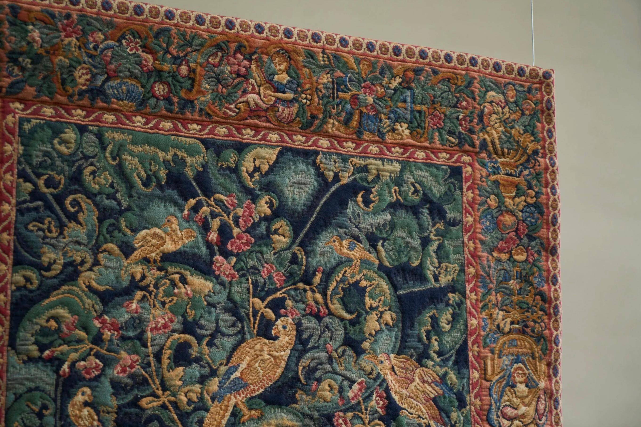 Mid Century wall tapestry with birds, animals, and leaves, Belgium 1960s.