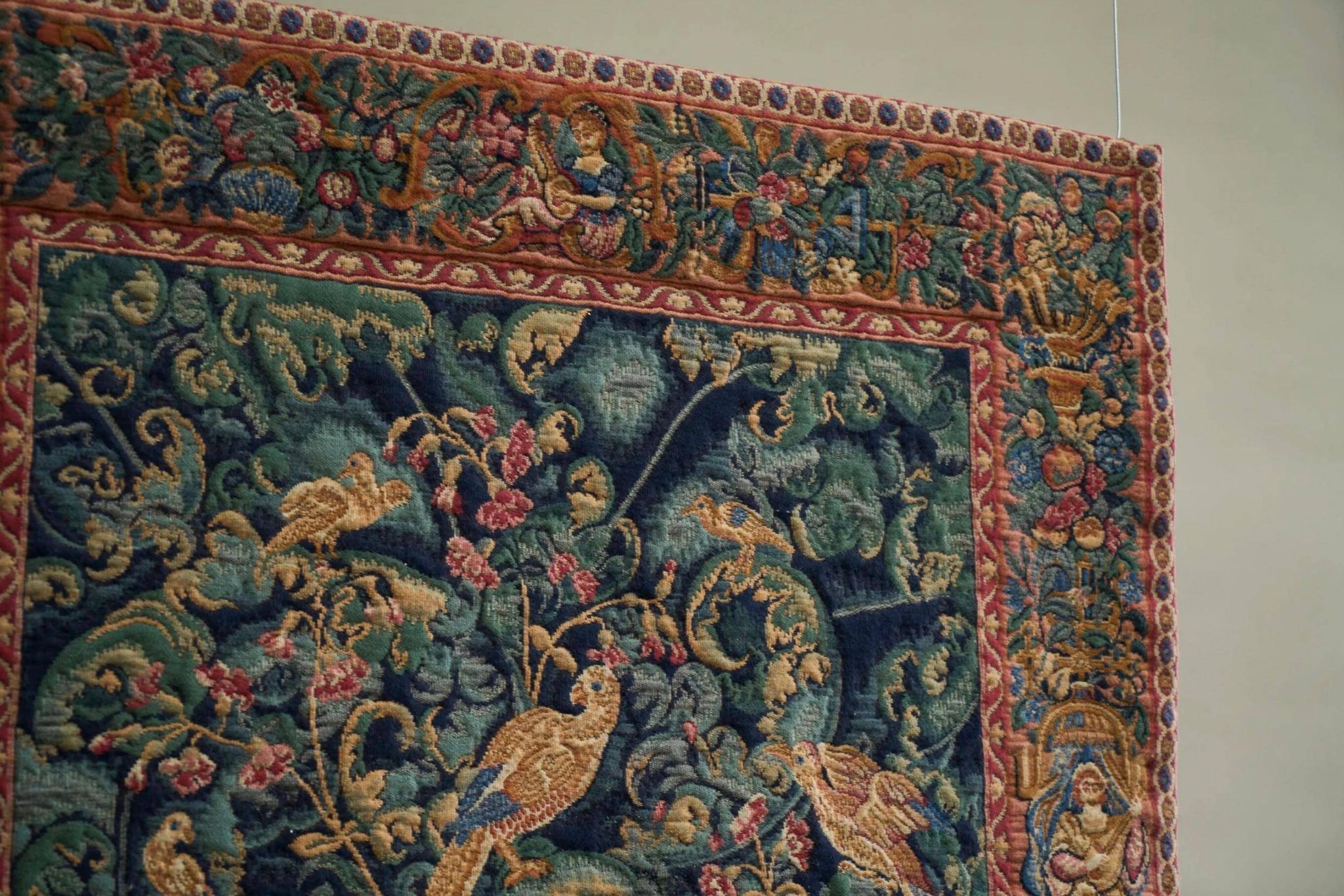 Mid Century wall tapestry with birds, animals, and leaves, Belgium 1960s.