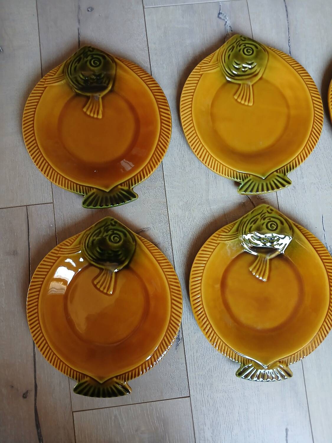 8 antique plates in majolica fish shape