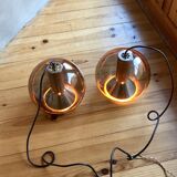 Pair of raak Amsterdam globe suspensions