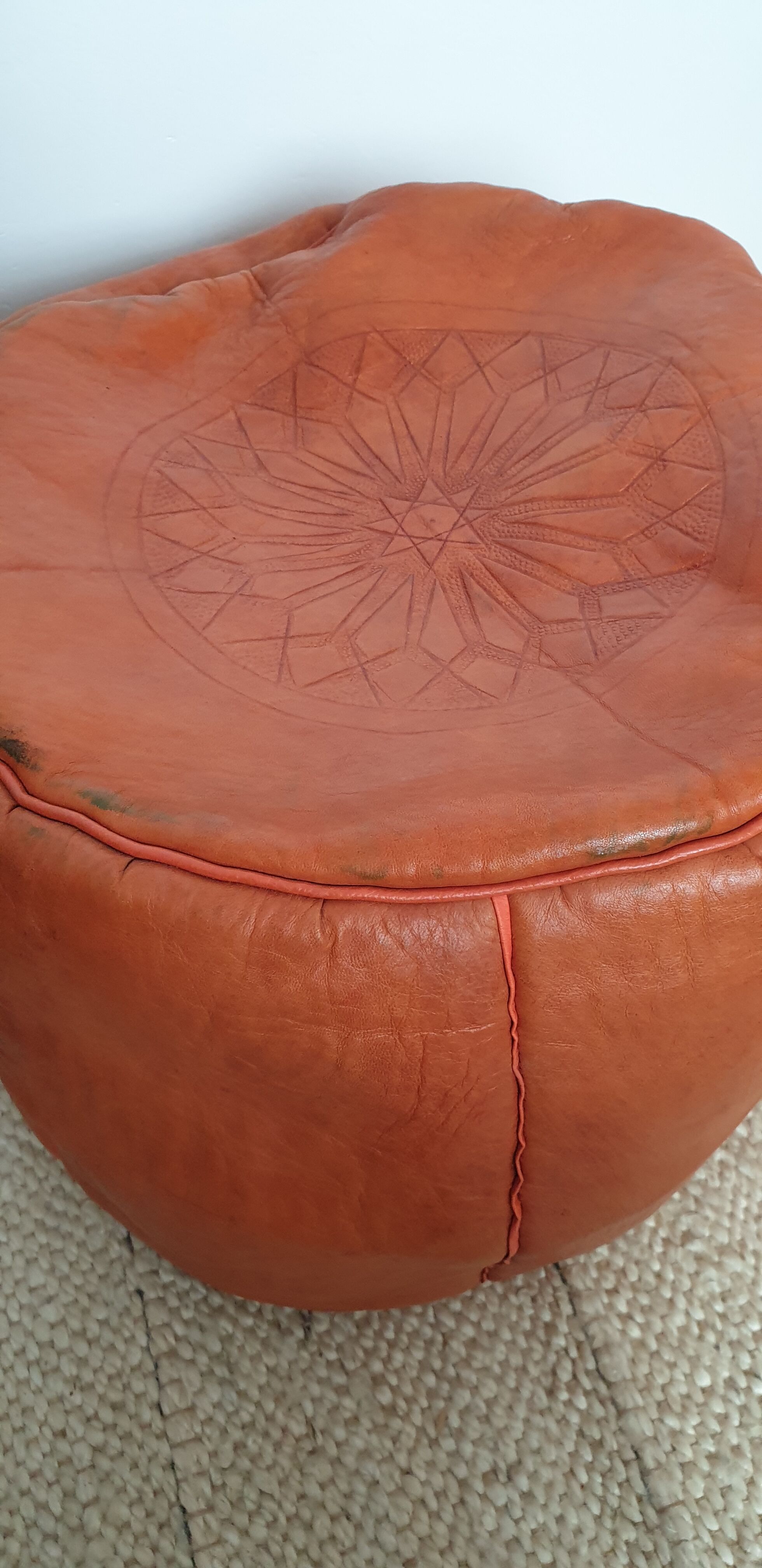Moroccan leather orange pouf