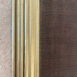 Five-panel golden metal fireplace screen from the 19th century.