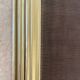 Five-panel golden metal fireplace screen from the 19th century.