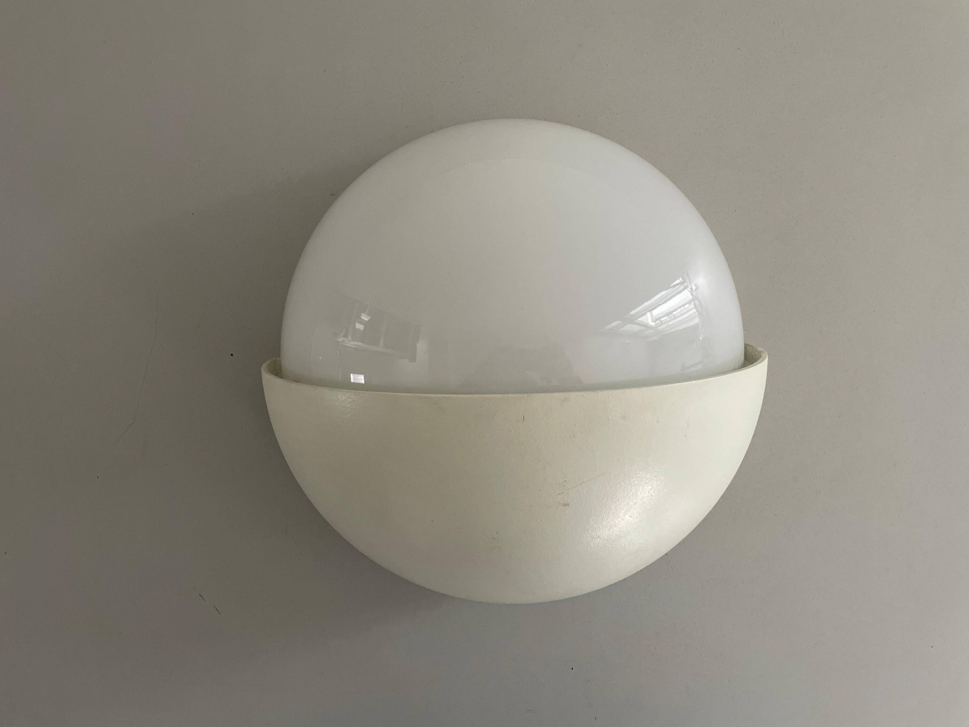 Round wall lights, small and large, in white metal by Bega, 1970s, Germany.