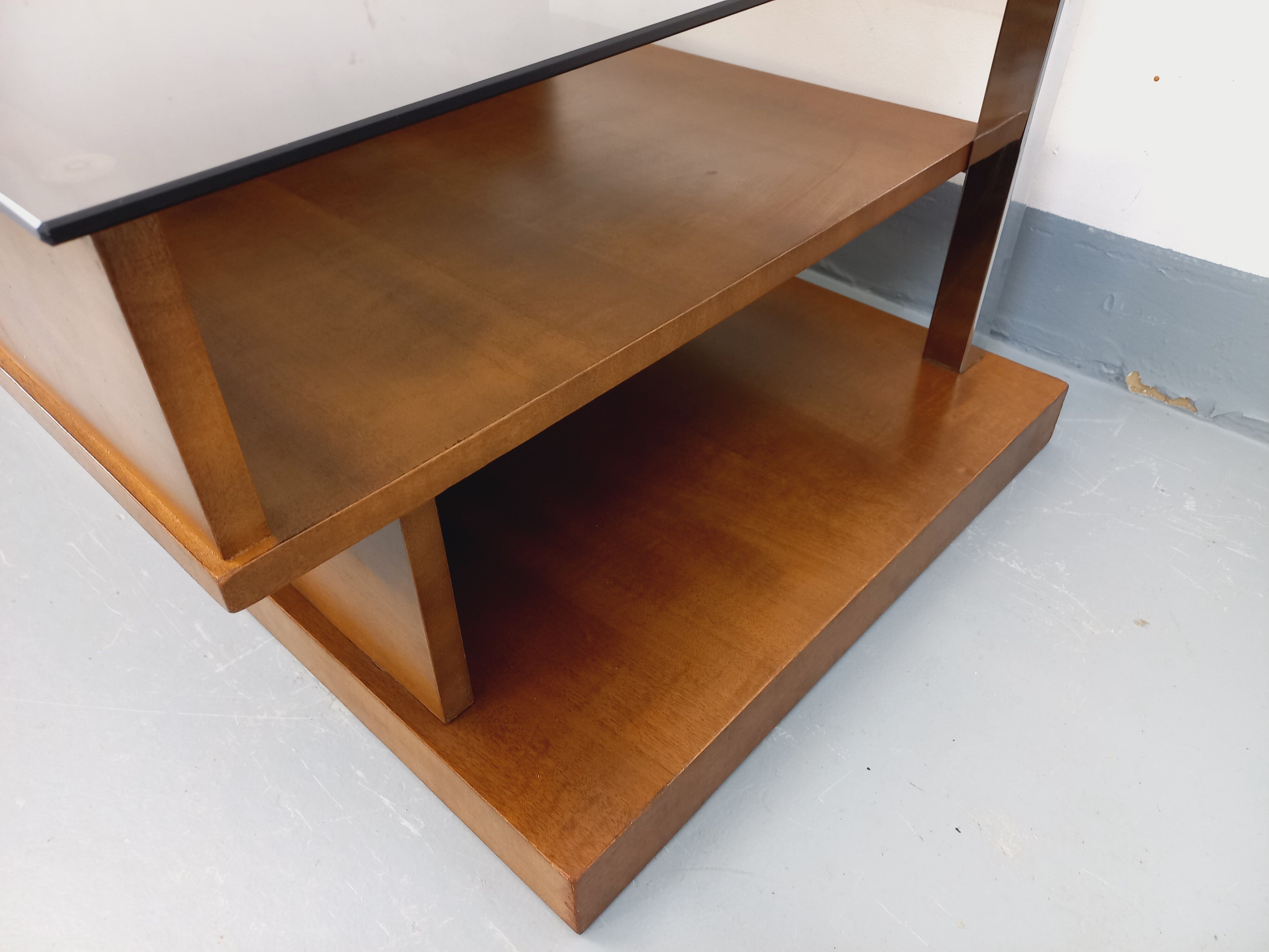 Rectangular vintage modernist coffee table with wooden niches, chrome.