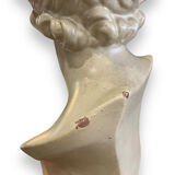 Bust of eros in glazed terracotta