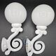 Pair of white enameled cast iron wall sconces, mid-20th century