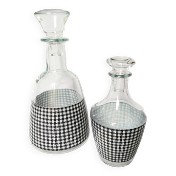 Set of 2 black and white houndstooth glass carafes from the Arques crystal factory. Rare.