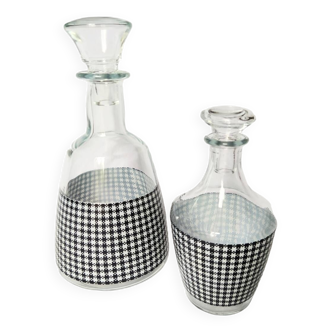 Set of 2 black and white houndstooth glass carafes from the Arques crystal factory. Rare.