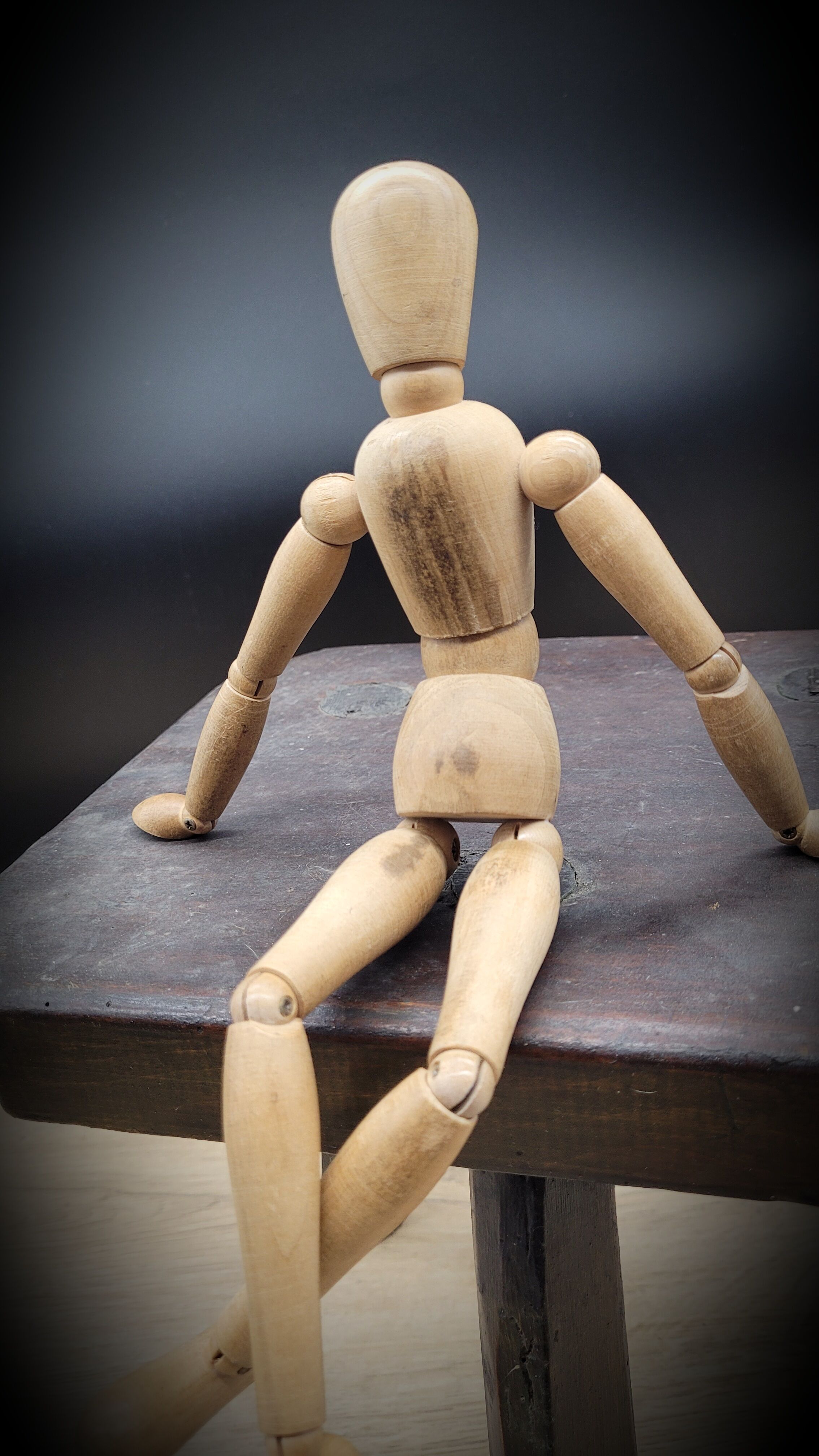 Dark octagon tripod stool