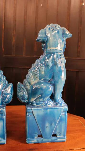 Pair of Foo dog bookends in turquoise glazed ceramic, Manises