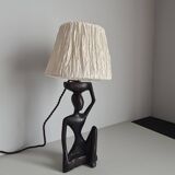 Ebony lamp with seated woman / 1930s
