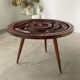 Table basse années 60 tripode bois ciselé
