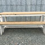 Farmhouse table with its two benches
