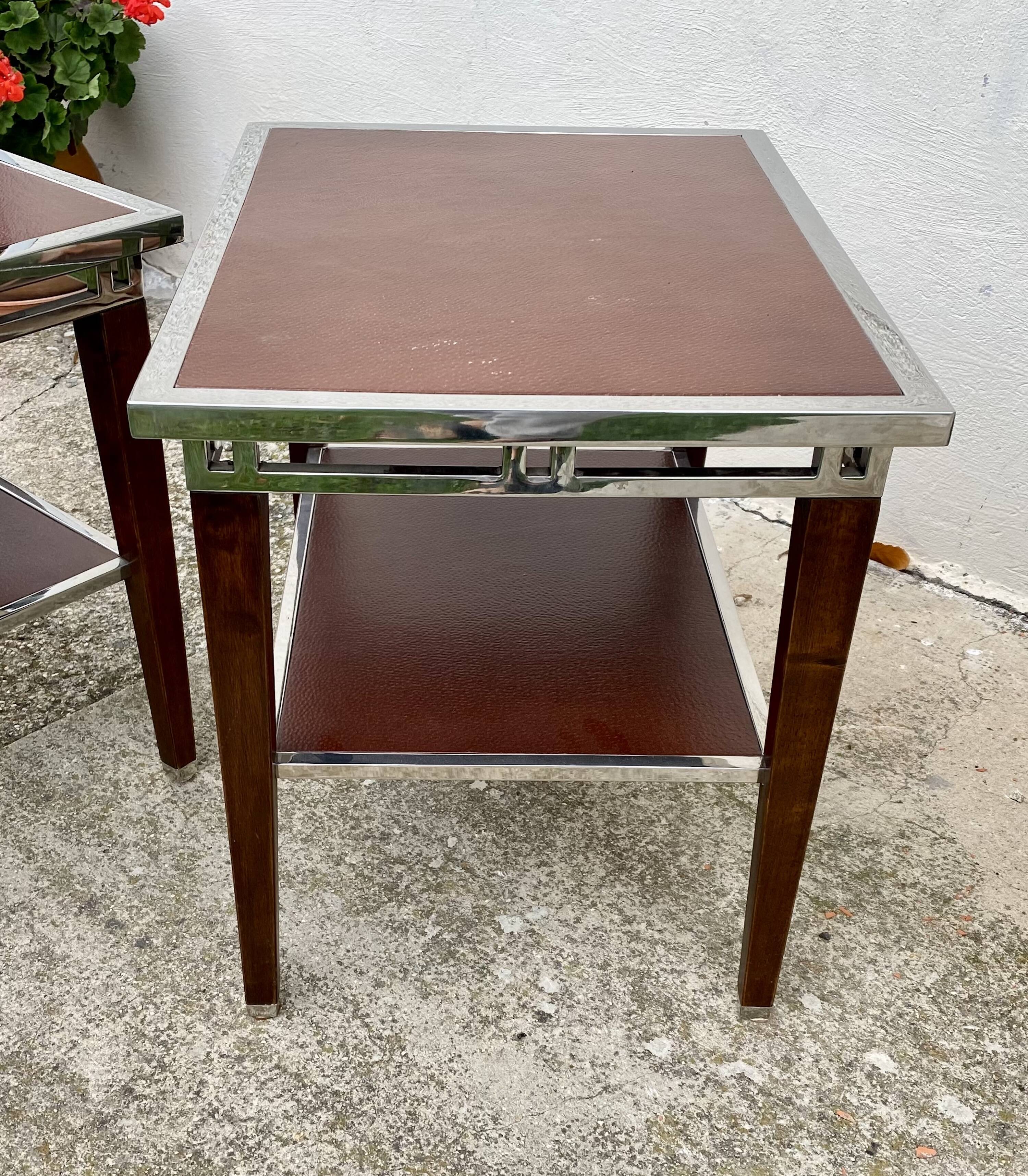 Pair of modernist chrome, leather and wood side tables