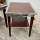 Pair of modernist chrome, leather and wood side tables.