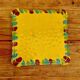 Yellow ceramic trivet and bottle coaster with vintage painted decoration.