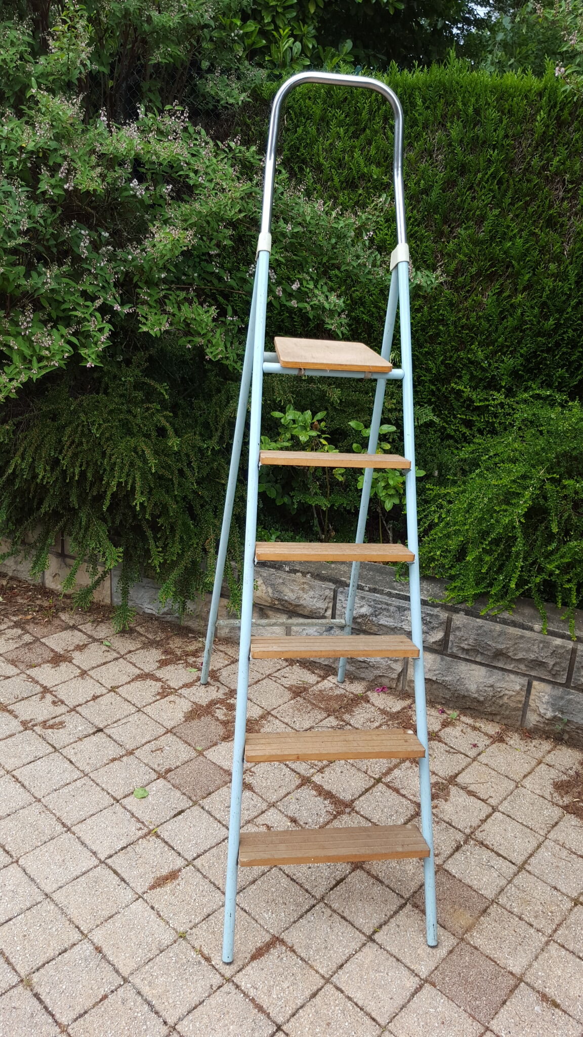 Vintage stepladder blue wooden steps