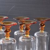 6 amber-footed champagne flutes in very good condition.