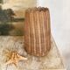 Scalloped rattan vase