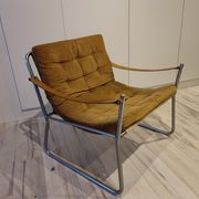 Scandinavian living room armchair in tubular chrome and leather