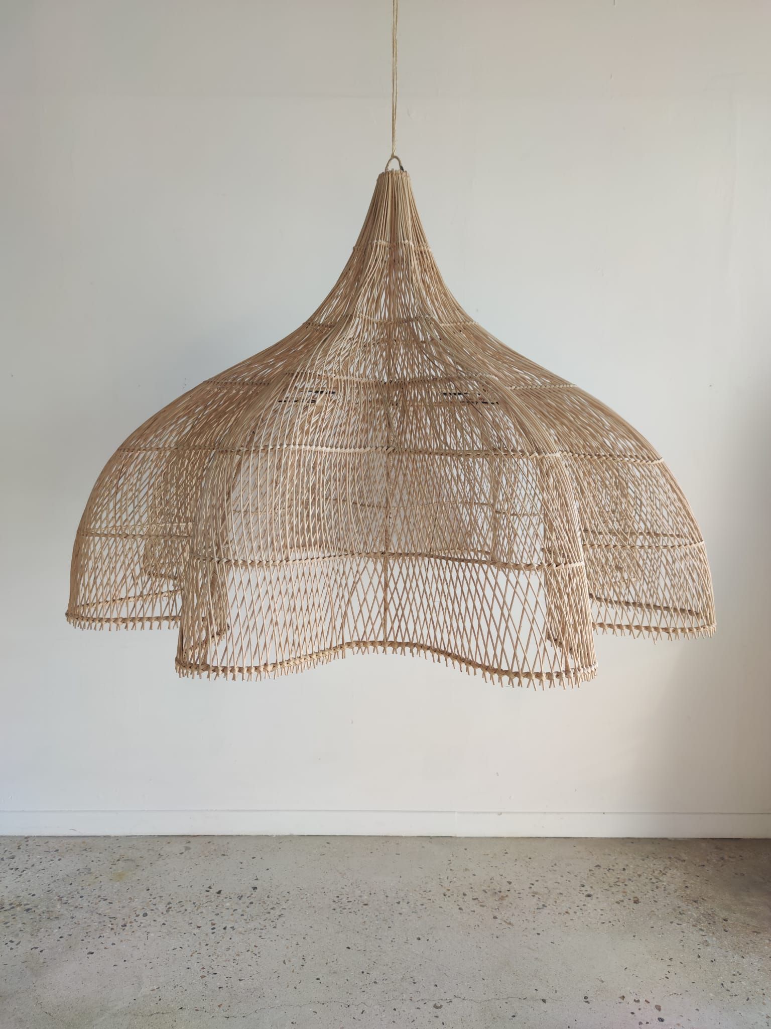 Huge rattan suspension in the shape of a corolla H:1m; D: 1m50