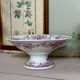 Magnificent antique compote fine porcelain with pink floral decoration.