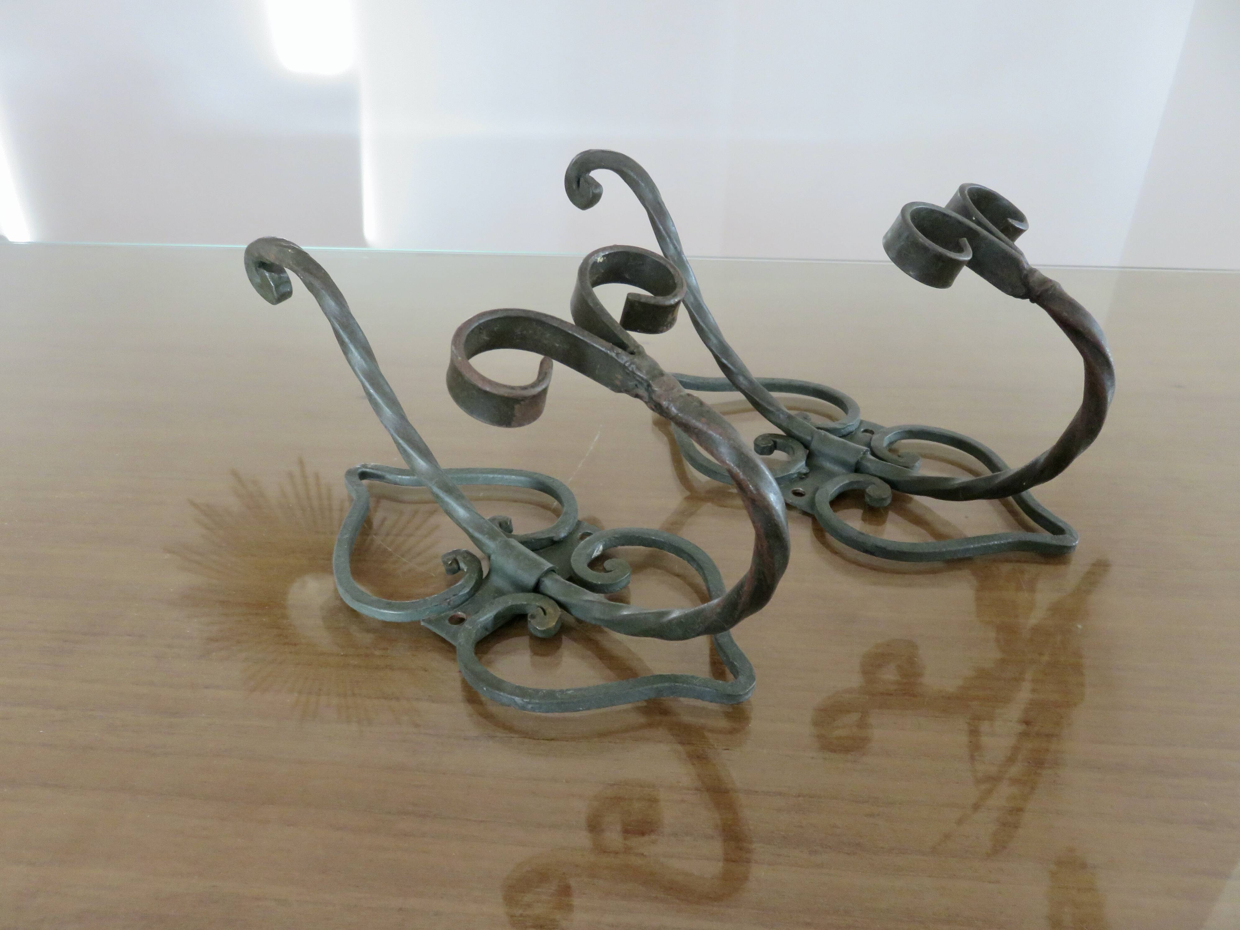 Pair of green lacquered wrought iron wall hooks, art deco, 1930s 40s