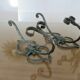 Pair of green lacquered wrought iron wall hooks, art deco, 1930s 40s