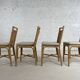 Suite de 4 chaises en rotin cannage et laiton