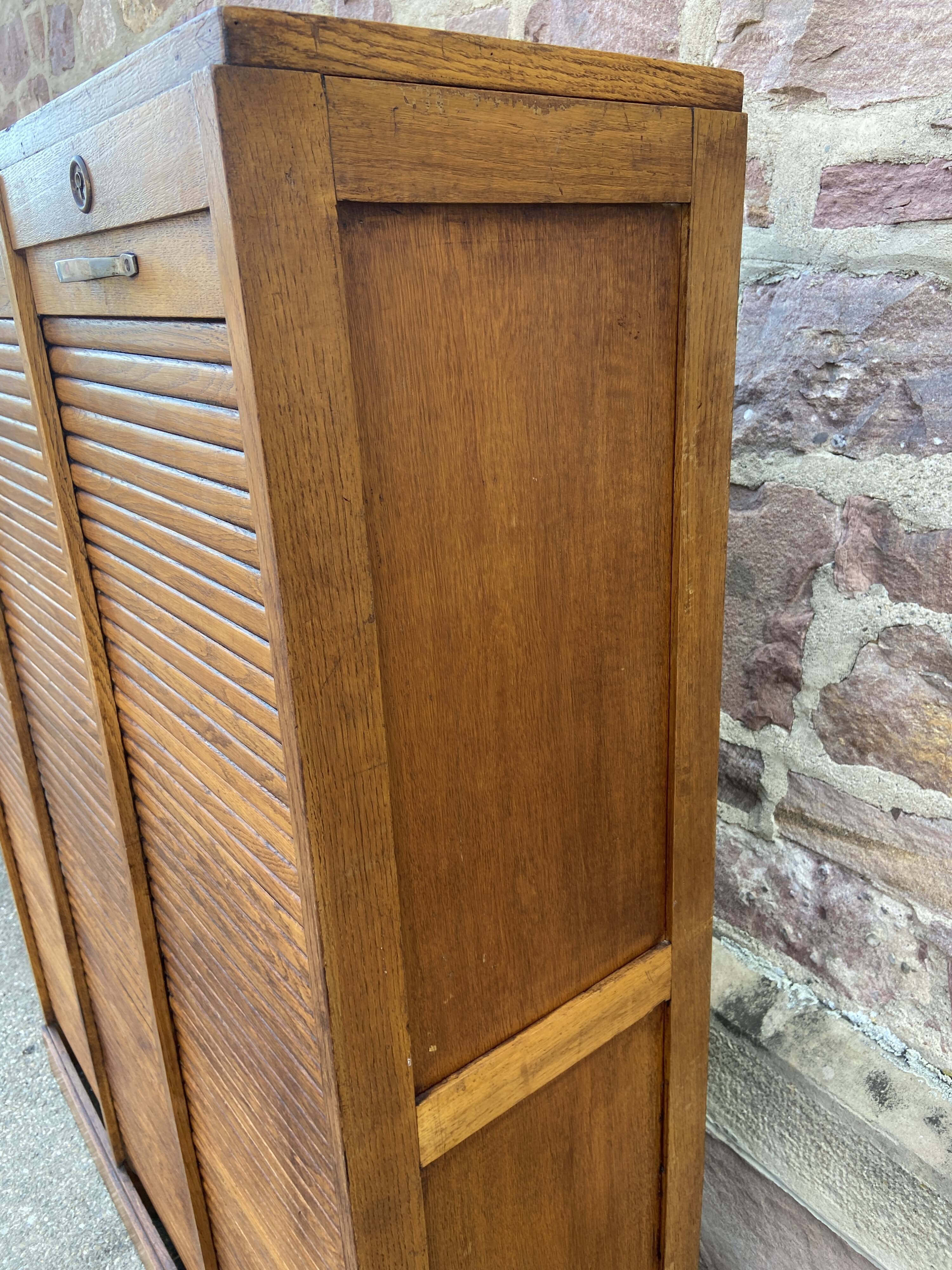 Vintage sliding curtain binder cabinet