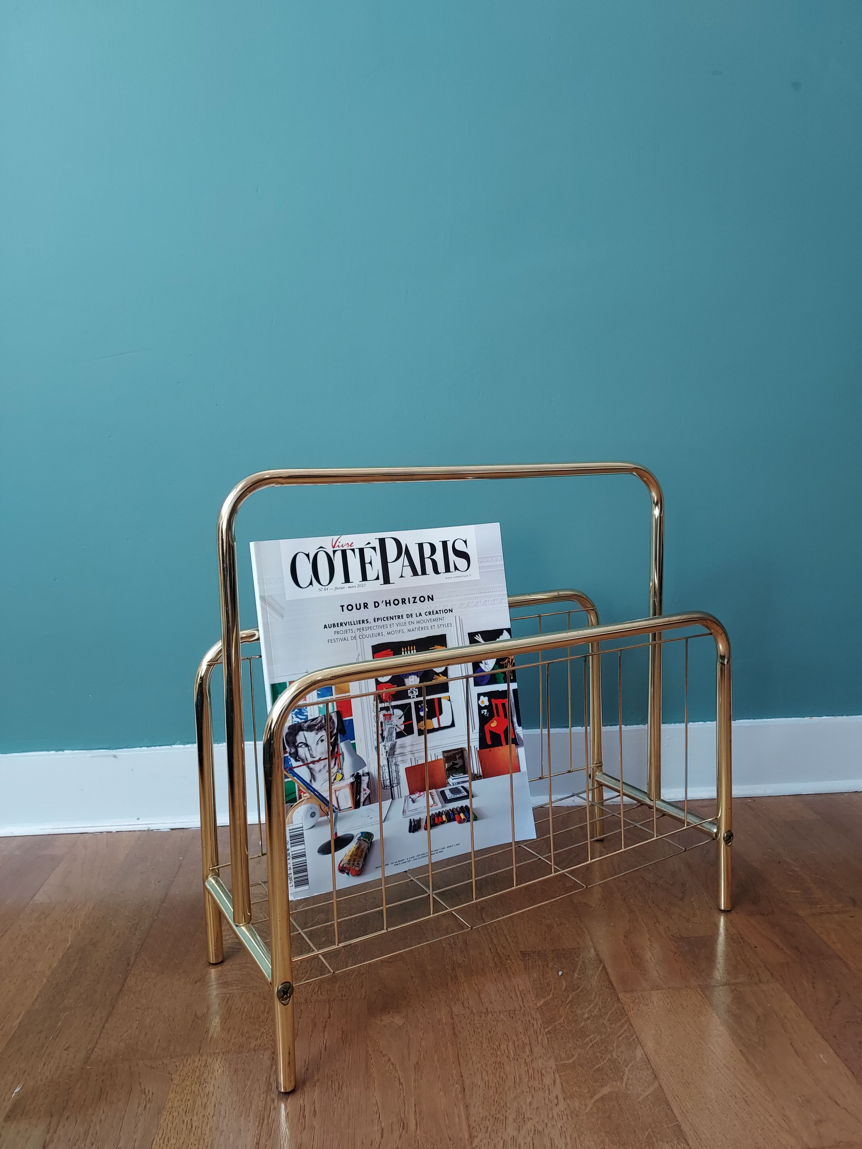 Gilded metal magazine door