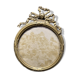 Old photograph of soldiers in a brass frame