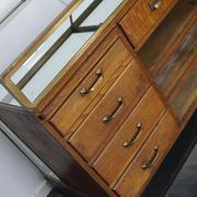 Counter or shop window in oak glass and brass France around 1920