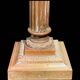 Bronze candle holder with floral motifs.
