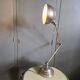 Old adjustable industrial lamp in bronze with 2 arms.