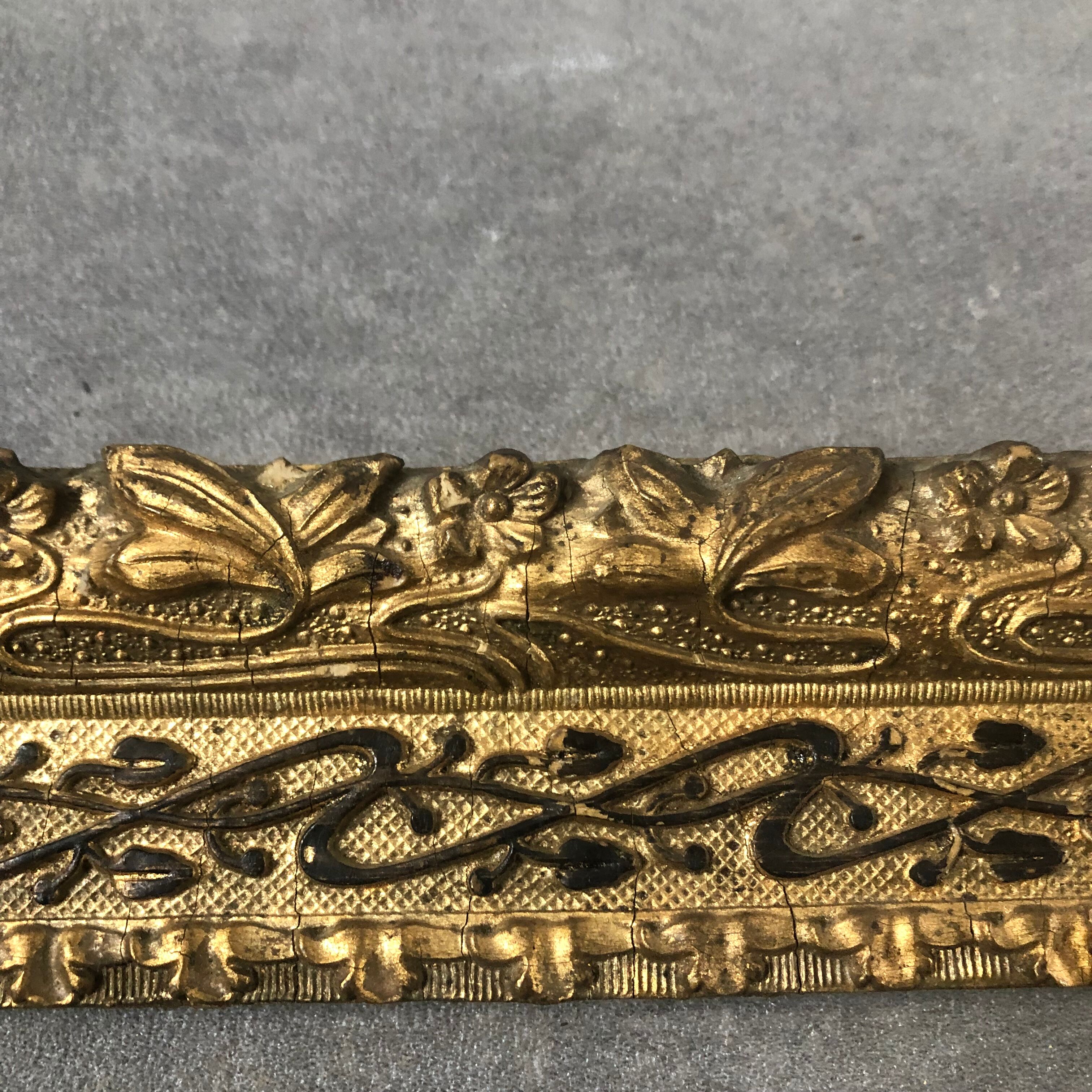 Old wooden frame and gilded stucco 50x60